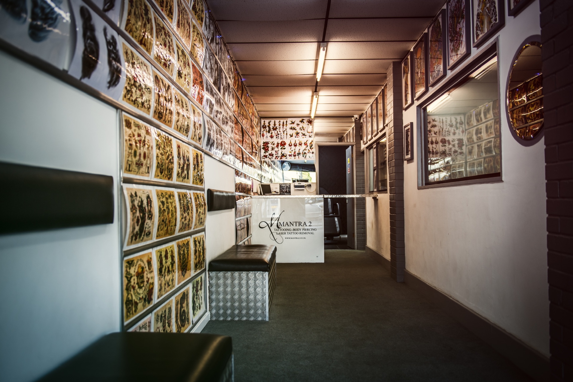 Reception corridor at Mantra 2 with flash artwork walls